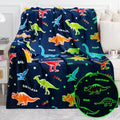 Jekeno Dinosaur Glow in The Dark Blanket Dino Gift Throw for Kids Boys Girls Birthday Christmas Halloween Easter Decor for Age 1-16 Years Old Teens Child Toddler Son Throw Navy Blue 50"x60" by Jekeno
