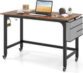 COSTWAY 48” Mobile Computer Desk, Home Office Desk on Wheels, with Reversible Storage Bag & 2 Earphone Hooks, 4 Lockable Wheels, Metal Frame, for Small Space (Black + Rustic Brown) by COSTWAY