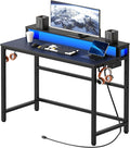 YATINEY Small Computer Desk with Charging Station and LED Lights, Gaming Desk with Monitor Stand, 2-Tier Home Office Desk with 4 Side Hooks, for Living Room, Home Office, Black DN01UDBBY2 by Yatiney