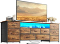 Huuger 63 Inch TV Stand for 65, 70 Inch TV, 11 Drawer Long Dresser with Power Outlets and LED Lights, Entertainment Center with Storage, Rustic Brown Dresser with PU Leather Surface by Huuger